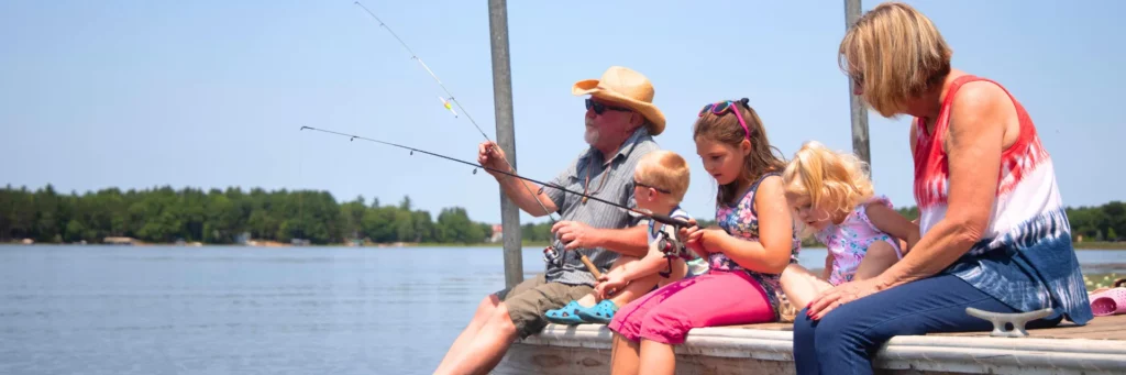 Healthcare for every age - grandparents fishing with grandchildren